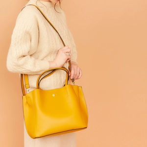 Chic yellow PU leather tote bag with crossbody strap and pebble texture for women