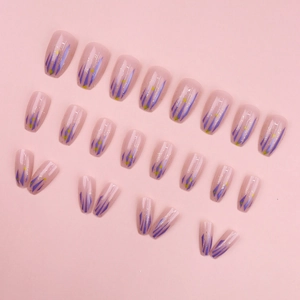 Pink press-on nails with purple geometric lines, yellow stars and golden glitter finish