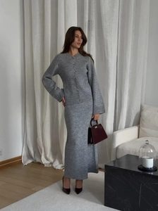 Elegant grey knit two-piece set featuring long-sleeved cardigan and long skirt for women