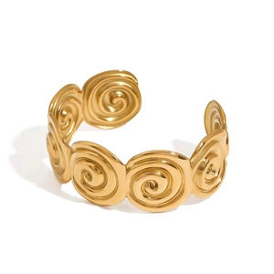 Luxurious gold stainless steel bangle featuring a detailed spiral seashell design