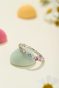 Close-up of S925 sterling silver ring featuring multi-colored gemstones in a polished finish