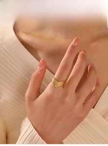 Detailed shot of an adjustable V-shaped 18K gold plated stainless steel ring for women