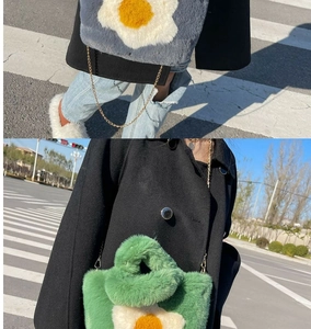 Outdoor street style view of plush tote bags with chain straps and fried egg patterns