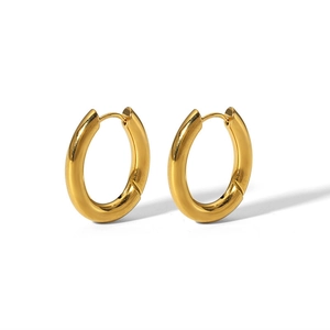Detailed close-up of polished gold hoop earrings with secure hinge closure on white background