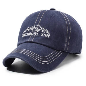 Retro washed navy blue baseball cap with mountain embroidery and white topstitching