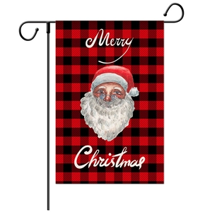 Christmas garden flag with Santa illustration on red buffalo plaid background