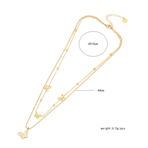 Golden double layer butterfly necklace with shell pendant showing size and 6.5g weight