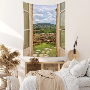 Macro shot of a bohemian window landscape tapestry hanging on a minimalist bedroom wall