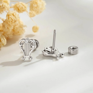 Elegant silver heart-shaped ear studs with small diamond and flat screw back design