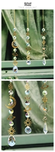 Detail of galaxy suncatchers with moon and star metal charms and crystal prisms