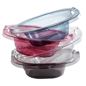 Transparent sitz bath basins for postpartum care in blue, rose, clear, and smoky grey colors