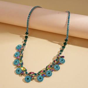 Detailed close-up of Bohemian layered necklace with turquoise stones and rhinestone clusters