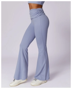 Detail view of high waisted flare yoga pants with side ruched waist and soft lavender fabric