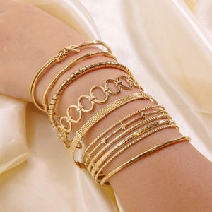 Fashionable 14k gold plated titanium steel stackable bangle set for women's wrist decor