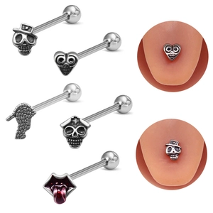Detail view of skull and lip tongue rings with close-up of piercings in use