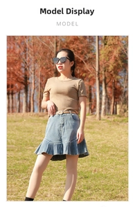 Brown ribbed knit top paired with denim mermaid skirt and elegant pearl buckle belt