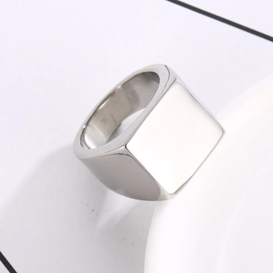 Detailed view of polished silver square minimalist ring in stainless steel material