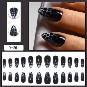 Long almond press-on nails with black leopard print and gradient honeycomb texture