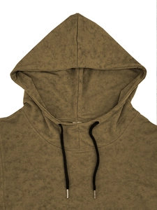 Close-up of vintage floral hooded vest with drawstrings and metal tips detail