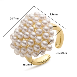 Adjustable gold ring featuring a cluster of white pearls with precise size measurements