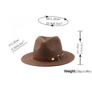 Detail of straw hat texture with brown leather band and golden buckle measurements