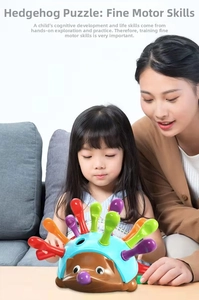Close-up of mother and child playing with colorful hedgehog fine motor skills toy