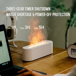 White 3D flame aroma diffuser and air humidifier with timer on a wooden desk