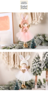 Detail of plush angel rabbit Christmas tree ornaments with pink and white mesh skirts