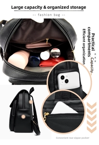 Detail of black pebbled leather backpack showing interior compartments and anti-theft back pocket