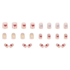 Press-on nails featuring colorful heart graffiti and blush base in a 24-piece full set