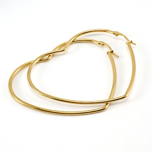 Elegant gold heart-shaped hoop earrings in polished titanium steel for women