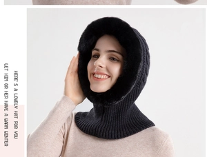 Detail of black knitted balaclava with faux fur trim and vertical stripe texture