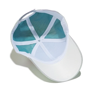 Detail view of the six-panel interior lining and adjustable buckle of the faux leather cap
