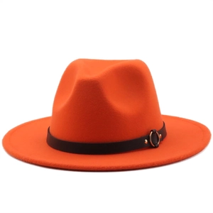 Detailed view of bright orange wool fedora hat featuring black leather band and gold buckle