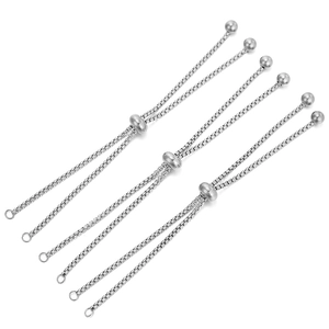 Detail of six adjustable silver stainless steel box chains with sliding beads for jewelry