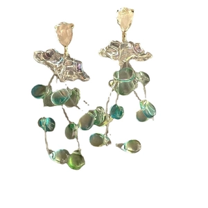 Floral fringe drop earrings with green teardrop beads and crystal accents