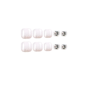 Faux ongles blancs avec dégradé pailleté rose et strass argentés scintillants pour pieds