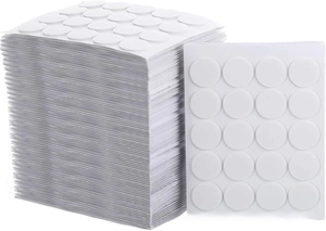 Bulk pack of white circular adhesive glue stickers for candle wick DIY projects