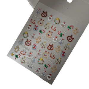5D Christmas nail stickers with 3D embossed Santa, reindeer, and snowman designs