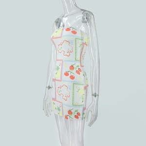 Detail of white strapless bodycon mini dress with colorful summer fruit pattern print