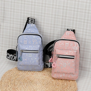 Detail of two stylish crossbody chest bags in lavender and pink with letter prints