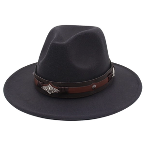 Detail of wool fedora hat with brown leather band and embossed vintage silver metal buckle