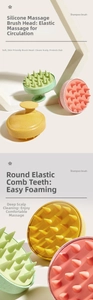 Detail view of the soft silicone bristles and ergonomic handle on the shampoo brush