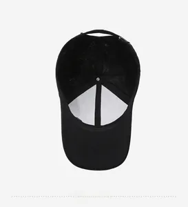 Interior detail of black baseball cap showing reinforced lining and adjustable back buckle