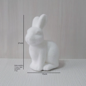 Detailed dimensions of white flocked Easter rabbit figurine showing 21cm height and 15cm length