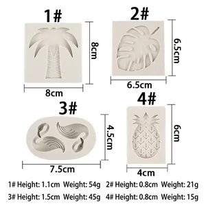 Silicone fondant molds featuring flamingo, palm leaf, coconut tree, and pineapple shapes