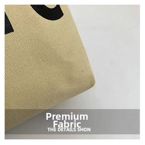 Close-up of durable textured canvas fabric with premium black letter printing