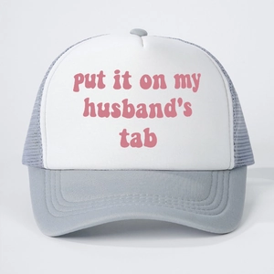 Trucker hat with pink 'put it on my husband's tab' text on white and grey mesh