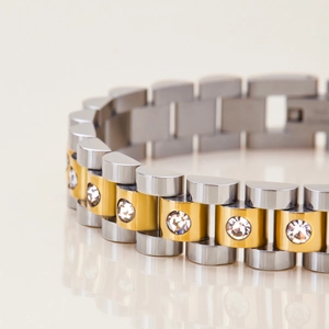 Luxe two-tone stainless steel bracelet featuring round zircon stone inlay with a polished finish