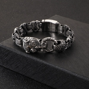 Detailed close-up of retro lion head men's bracelet with 316L stainless steel engraving